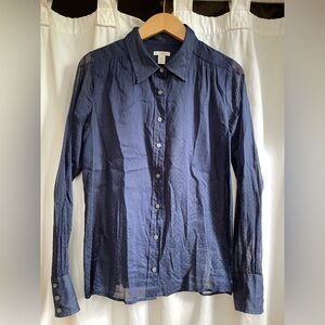 See thru dark navy button down dress shirt.